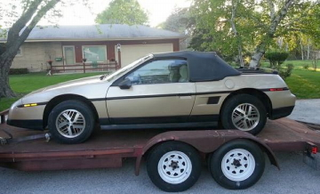 Illustration for article titled This 1986 Pontiac Fiero 2M6 Convertible Asks $2,800, Has Killed
